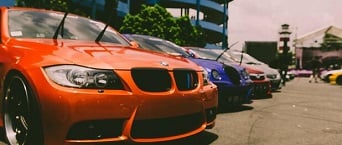 Canva - Cars Parked Outside on Concrete Road-1