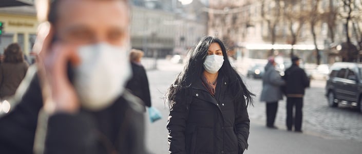 Canva - Woman in Black Coat and Face Standing on Street